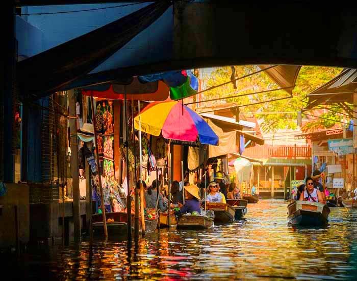 Tourists enjoying boat rides